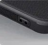 A close-up view of a black phone case with a textured surface and two circular cutouts. Produktbild-Vorschau
