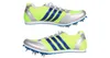 Two athletic shoes with spikes are shown against a white background. Náhľad obrázku produktu