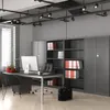An office desk with a computer, filing cabinets, and a chair. Anteprima dell’immagine prodotto