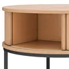 Close-up view of a round coffee table with wooden shelves and black metal legs. Produktbild-Vorschau