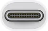 A close-up, top-down view of an Apple Thunderbolt 3 (USB-C) to Thunderbolt 2 adapter. Produktbild-Vorschau