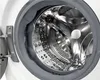 Close-up view of the inside of a washing machine drum. Produktbild-Vorschau