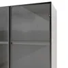 A close-up view of a modern white cabinet with glass doors. Anteprima dell’immagine prodotto