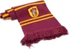 A Gryffindor scarf with fringe is laid out on a white background. Náhled obrázku produktu