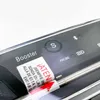 Close-up view of a digital thermometer probe inserted into a black device with a screen. Produktbild-Vorschau