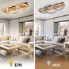A split image showing a modern living room with a sectional sofa and coffee table. The left side shows the ceiling light on, and the right side shows it off. Anteprima dell’immagine prodotto