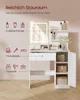 A white vanity table with a lighted mirror and storage compartments, showcasing its capacity for beauty products. Produktbild-Vorschau