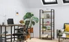 A home office setup with a desk, chair, and bookshelf. Produktbild-Vorschau