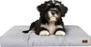 A puppy lying on a dog bed. Náhled obrázku produktu