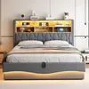 A modern upholstered bed with integrated shelving and LED lighting in a bedroom setting. Náhľad obrázku produktu