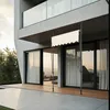 A modern house with a wooden deck and a retractable awning. Náhled obrázku produktu