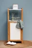 A bathroom shelving unit with storage and accessories. Produktbild-Vorschau