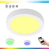 A smart ceiling light with multiple color options, shown with smaller examples of different colors and a smartphone interface. Náhľad obrázku produktu