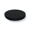 A black wireless charging pad with the 'MI' logo on a white background. Produktbild-Vorschau
