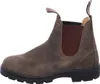 A side view of a single brown leather boot. Voir les images du produit