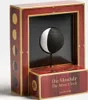 AstroMedia Die Monduhr (The Moon Clock) product packaging with a moon phase display. Produktbild-Vorschau