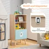 A children's bookshelf with toys and decorative items, set in a room with a tent and a sofa. Anteprima dell’immagine prodotto