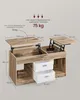 A diagram showing the dimensions and weight capacity of a lift-top coffee table. Produktbild-Vorschau