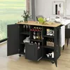 A kitchen cart with a wooden countertop and black cabinets, filled with wine bottles and glasses, set in a dining room. Voir les images du produit