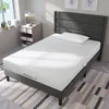 A bedroom scene with a mattress and bed frame. Produktbild-Vorschau