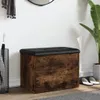 A storage bench with a black tufted lid sits in an entryway next to an umbrella stand and a large potted plant. Podgląd zdjęcia produktu