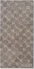 A close-up of a grey towel with a repeating pattern. Produktbild-Vorschau