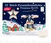 A box of pyramid tea lights with a Christmas-themed illustration. Produktbild-Vorschau