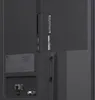 Close-up view of the back panel of a television, showing various ports and labels. Voir les images du produit