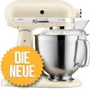 A cream-colored KitchenAid Artisan stand mixer is shown with a starburst overlay. The overlay has German text. Produktbild-Vorschau