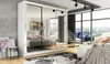 A spacious bedroom with a large mirrored wardrobe, a bed, and a view of a city skyline through a large window. Náhled obrázku produktu