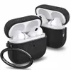 Two black protective cases for Apple AirPods Pro, each containing a pair of white AirPods. Produktbild-Vorschau