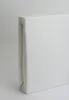 A white fitted sheet folded and standing upright against a white background. Produktbild-Vorschau