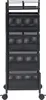 A black rolling cart with four perforated shelves and wheels, shown from the front against a white background. Produktbild-Vorschau