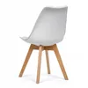 A white chair with wooden legs against a white background. Náhled obrázku produktu