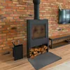 A modern living room with a wood-burning stove and accessories. Produktbild-Vorschau