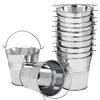 A collection of small, silver metal buckets with handles, some stacked and one lying on its side. Produktbild-Vorschau