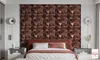A bedroom with a bed and a decorative wall panel behind it. Produktbild-Vorschau