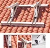 A metal mounting bracket is shown installed on a red tile roof, with close-up views of the bracket's assembly. Produktbild-Vorschau
