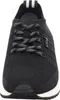 A close-up, front-facing view of a black sneaker with white laces and white stripes on the heel tab. Produktbild-Vorschau