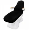 A black and white medical or spa chair with wooden armrests. Produktbild-Vorschau