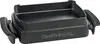 A black baking dish accessory for a grill. Anteprima dell’immagine prodotto