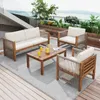 A patio set on a deck with a view of water and greenery. Produktbild-Vorschau