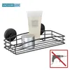 A black wire shower caddy with two suction cups, holding a tube of lotion and a jar of cream. Produktbild-Vorschau