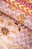 A close-up view of a floral patterned fabric, likely bedding, with a chevron pattern border. Produktbild-Vorschau