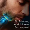 Close-up of a man's face with a beard, showing a grooming device trimming the beard. Visual effects indicate the device adapting to the beard. Produktbild-Vorschau