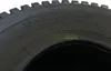 Close-up of a tire with text and a watermark. Náhľad obrázku produktu
