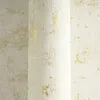 A close-up view of textured wallpaper with a distressed gold pattern. Produktbild-Vorschau