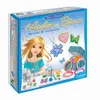 A box for a jewelry making kit, featuring an illustration of a girl and various jewelry pieces. Voir les images du produit