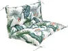 A cushion with a tropical leaf pattern on a white background. Produktbild-Vorschau