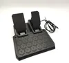 A pair of black gaming pedals on a white background. Anteprima dell’immagine prodotto